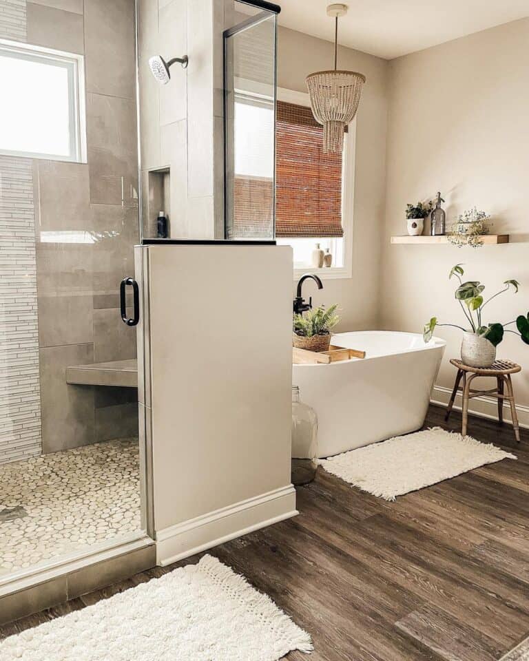 Brown Tile and Chrome Backsplash in a Corner Shower
