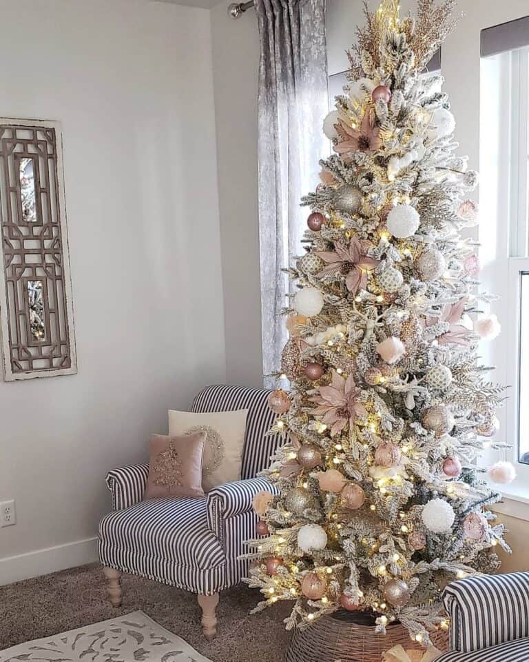 Cheerful Rose Gold Christmas Tree Decorations Between Two Armchairs