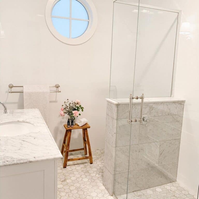 Corner Shower Ideas Include a White Hexagon Tile Floor