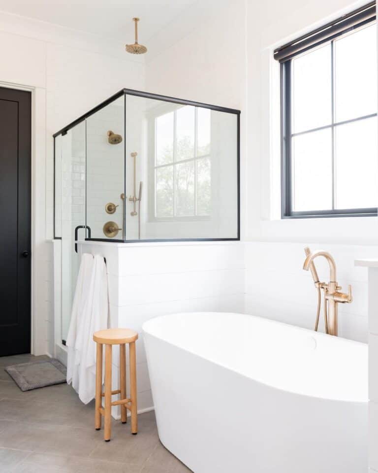 Corner Shower With Gold Hardware