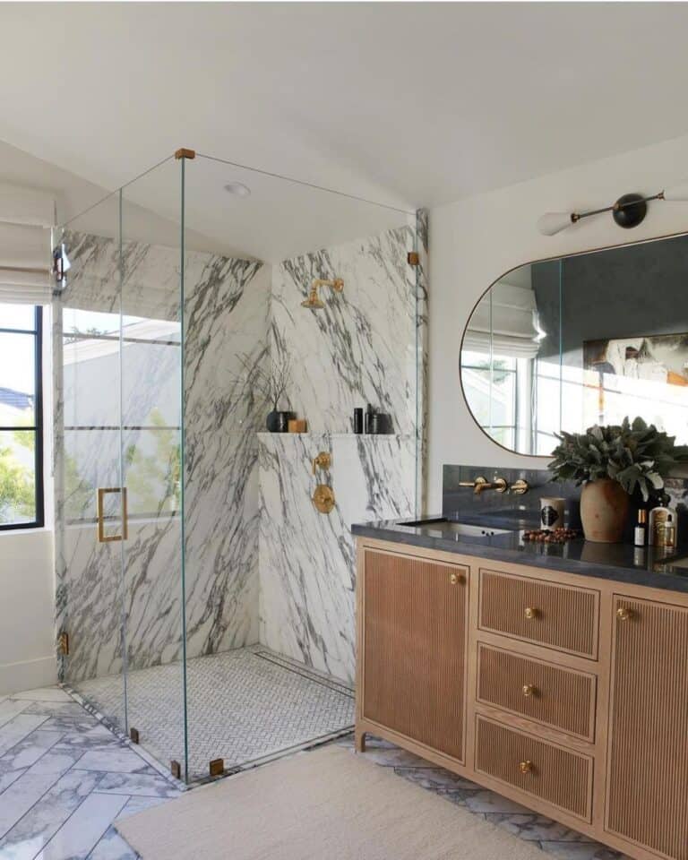 Corner Shower and a Herringbone Grey Tile Floor