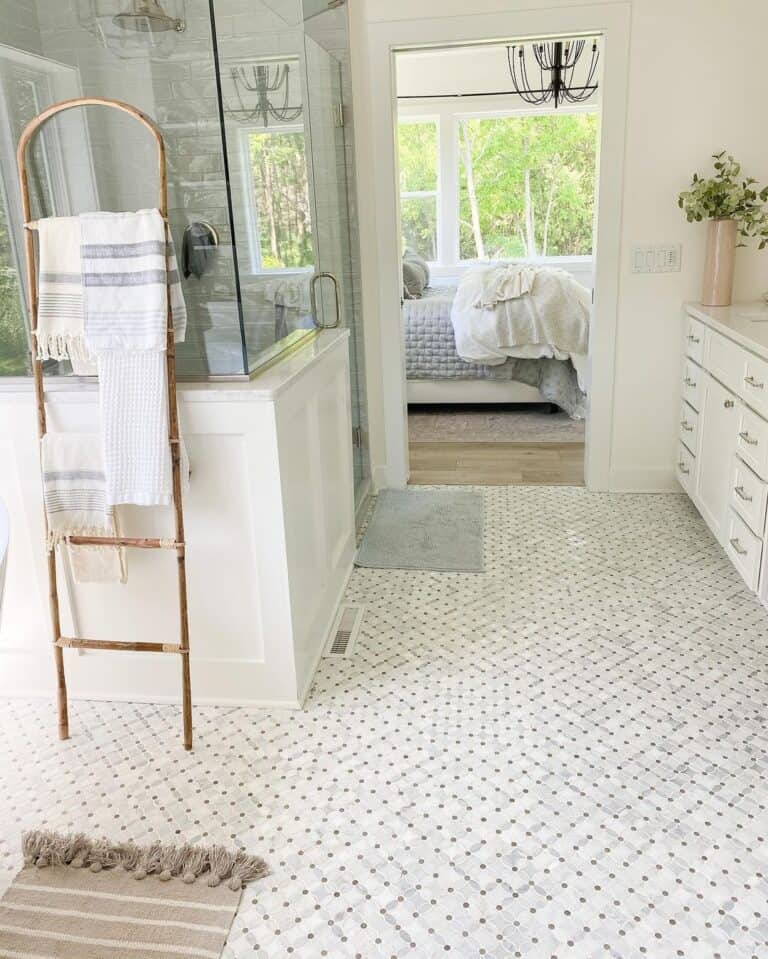 Corner Showers With Glass Doors and Gold Hardware