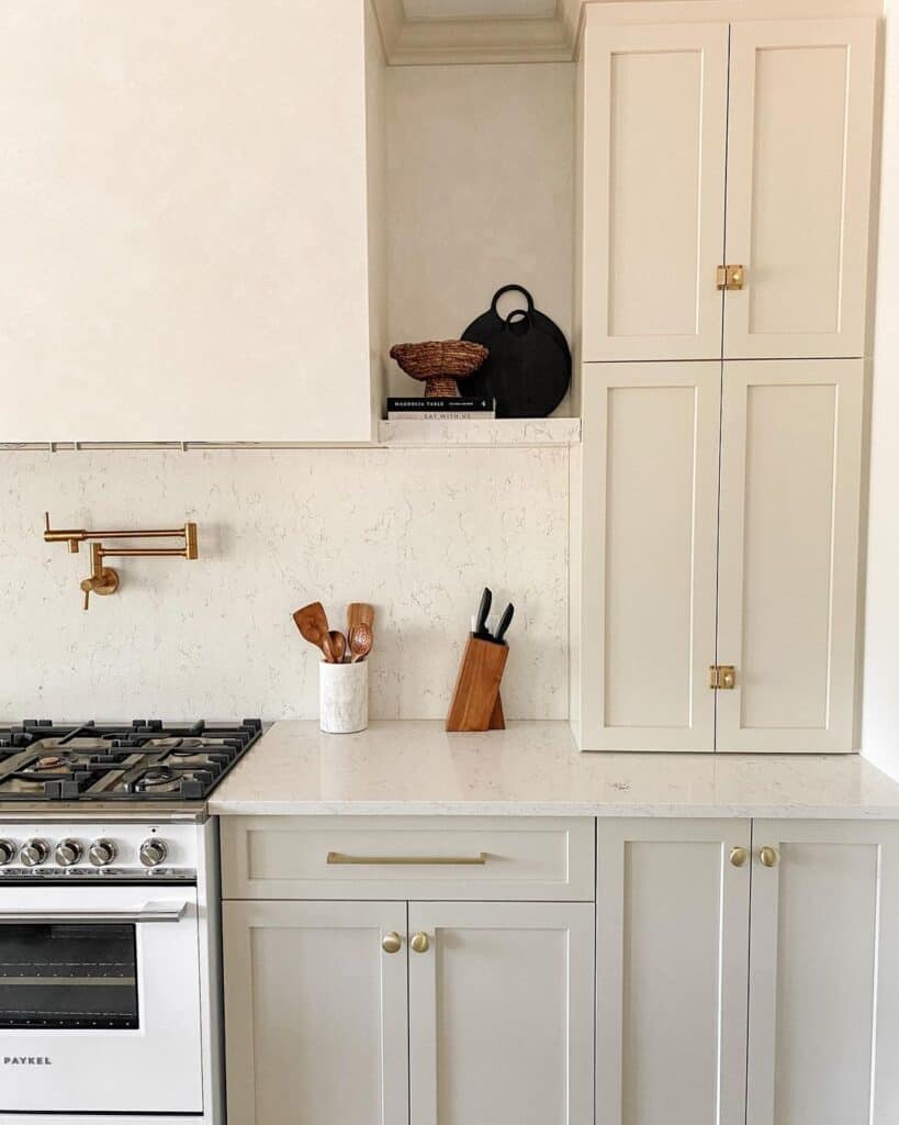 Cream Beige Kitchen Cabinets with Gold Hardware