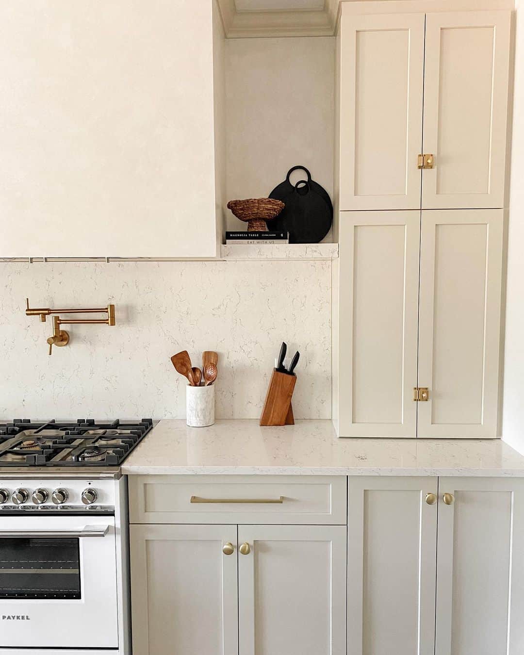 cream-beige-kitchen-cabinets-with-gold-hardware-soul-lane