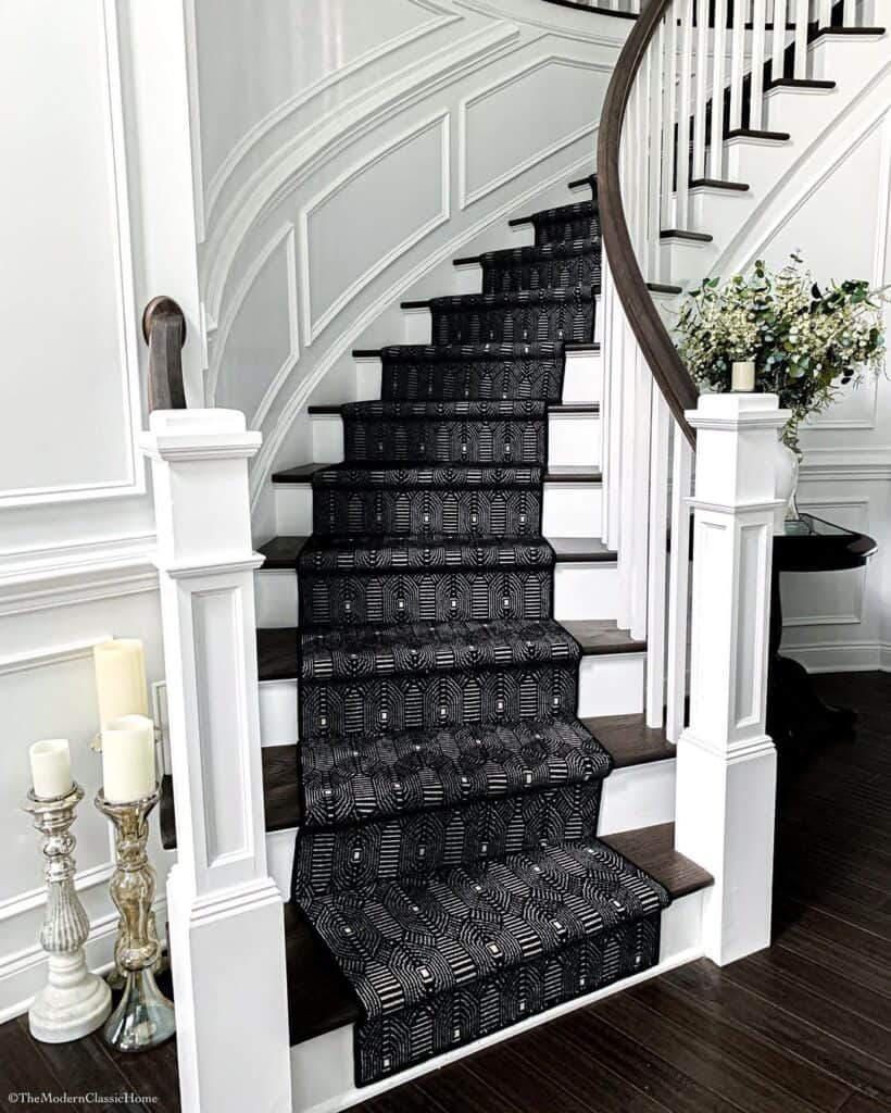 Curved Stairway with White Wainscoting