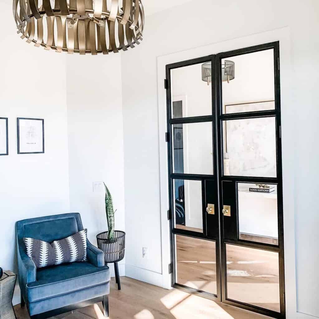 Double Black Iron French Doors with Satin Brass Knobs