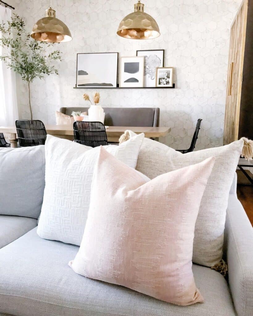 Dusty Pink Throw Pillow on Gray Sofa