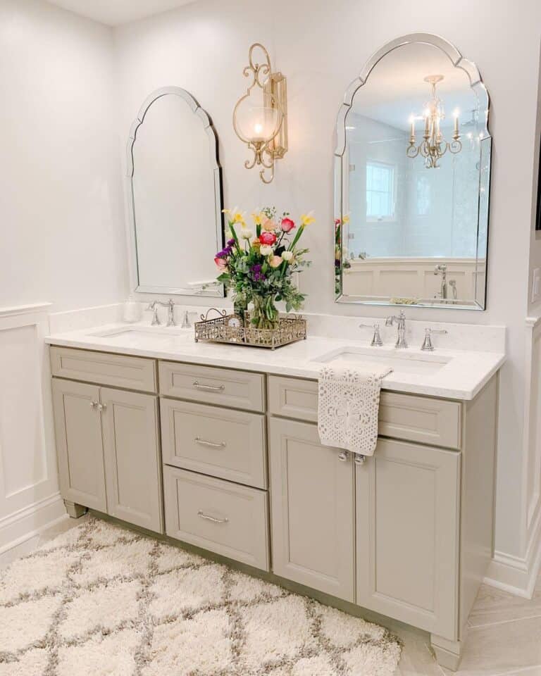 Elegant Bathroom with Beveled Arched Mirrors