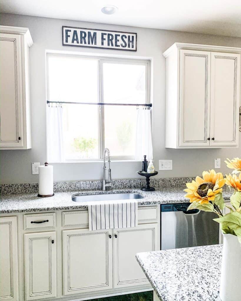Farmhouse Cabinets and Vase of Sunflowers