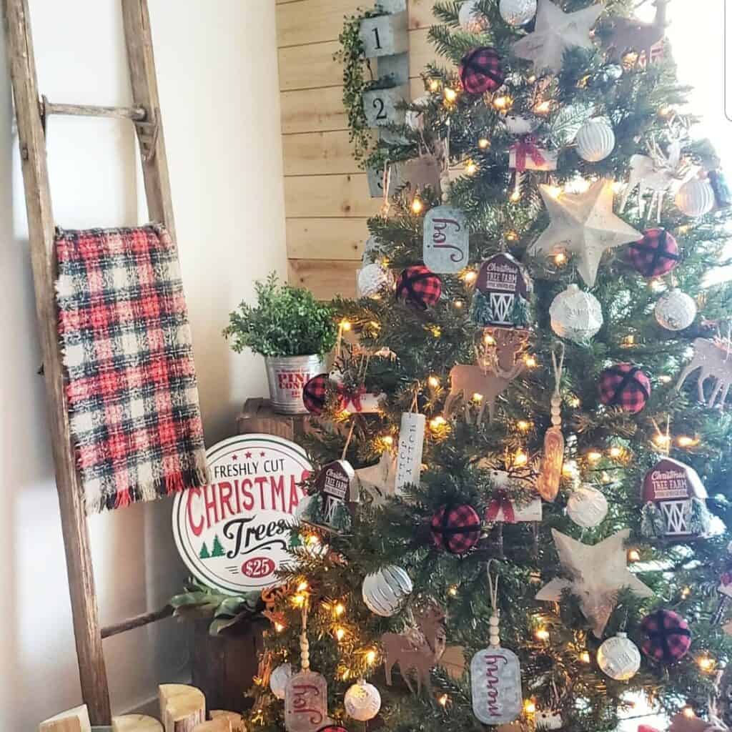 Farmhouse Living Room with Rustic Red and White Christmas Tree Decorations