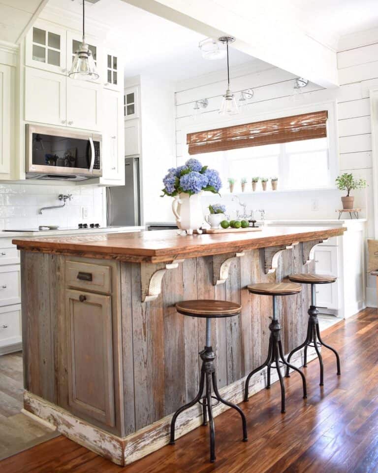 Farmhouse Style White Kitchen With Wood Island