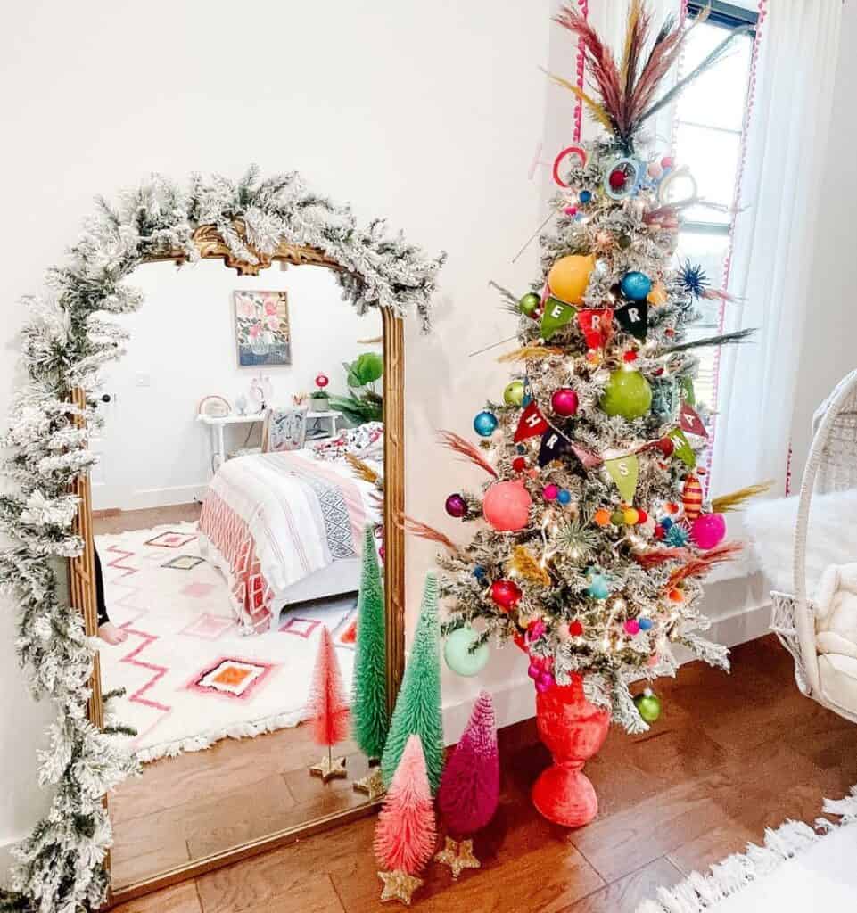 Flocked Christmas Tree with Colorful Decorations