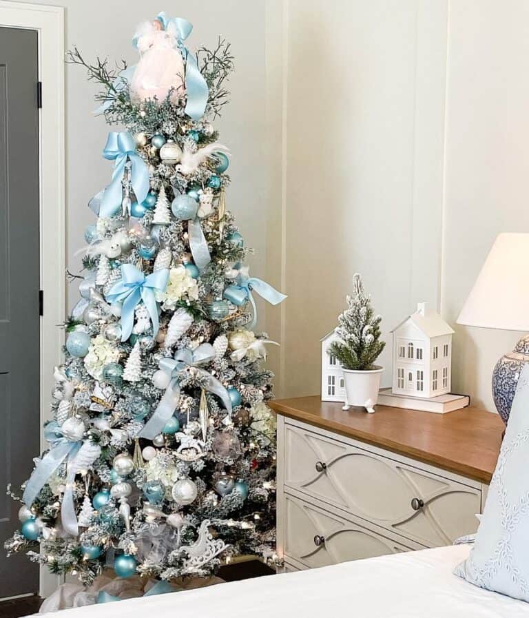 Flocked Tree with Blue Christmas Tree Decor
