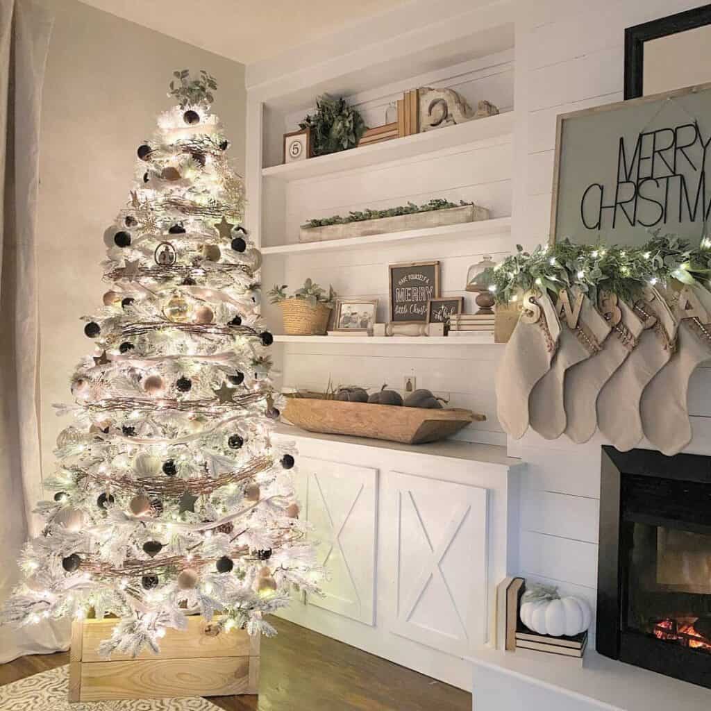 Glowing White Tree with Silver and Black Decorations