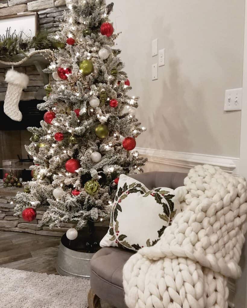 Gray Stone Fireplace with Small Frosted Christmas Tree