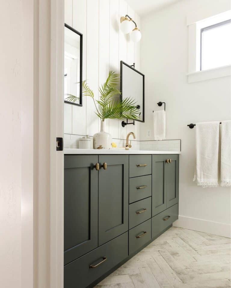 Herringbone Tile Floor with Dark Green Vanity