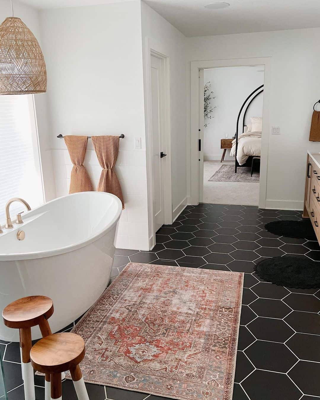 Hexagonal Black Bathroom Floor Tile with Soaking Tub Soul & Lane
