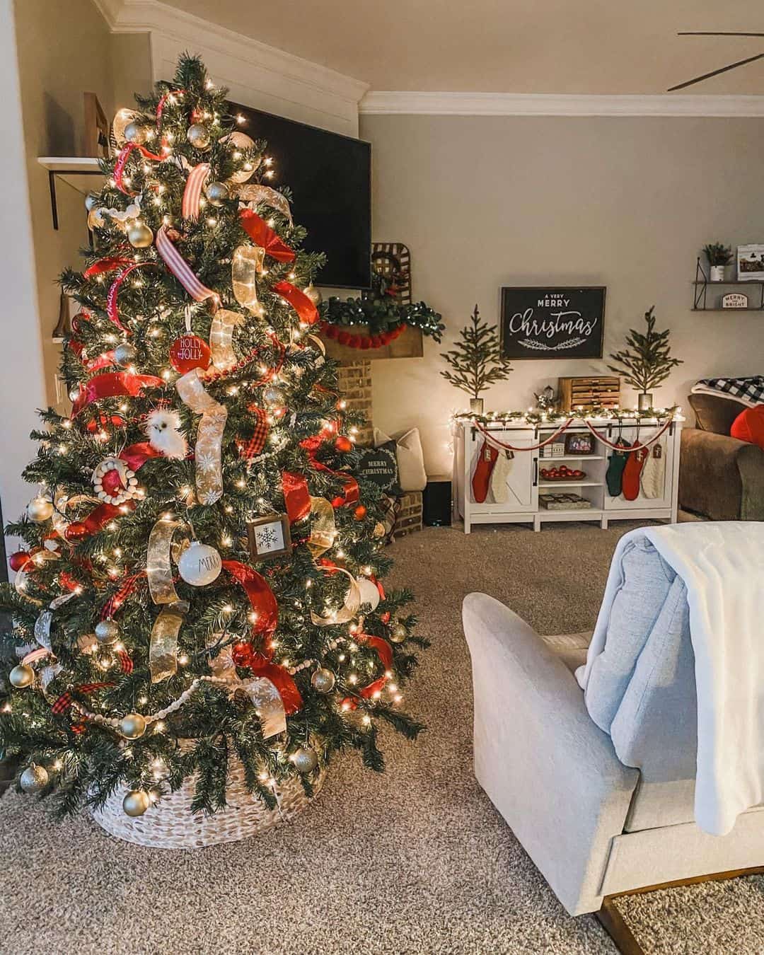 Festive Tree with Warm Browns, Reds, and Golds adorned with Feathers