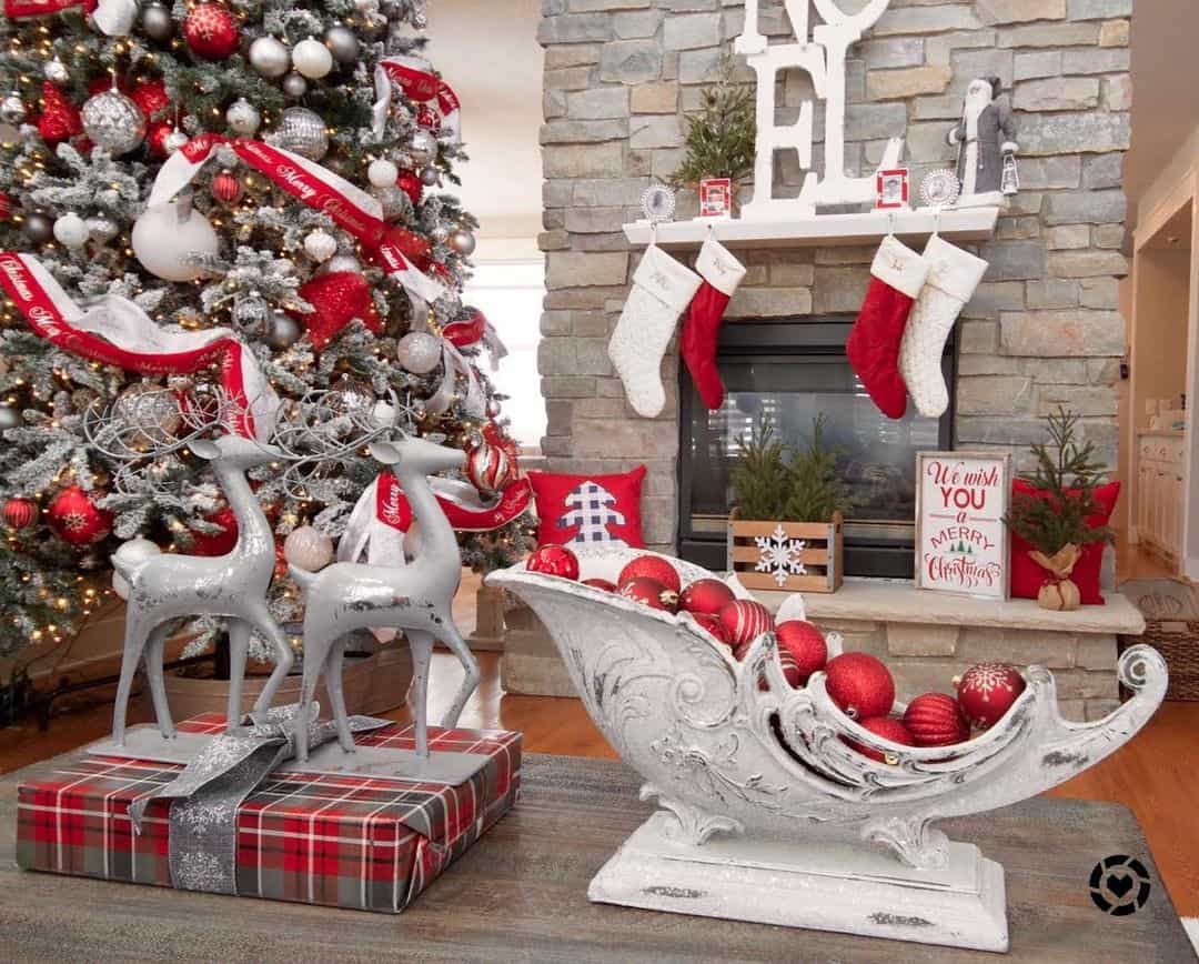 Large Red, White, and Silver Decorated Christmas Tree Next to Stone