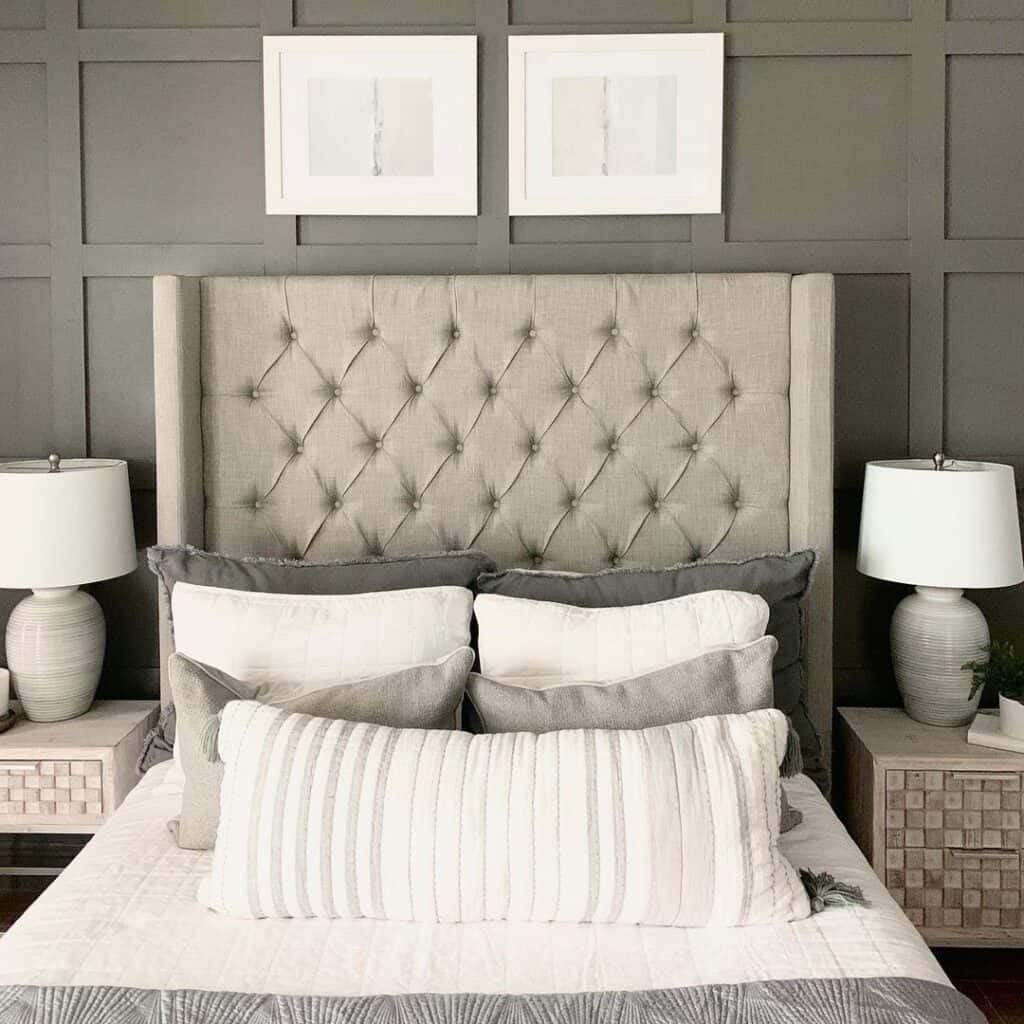 Light Grey Tufted Headboard Against a Paneled Wall