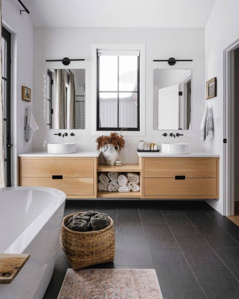 Light Wood Double Vanity with Black Bathroom Floor
