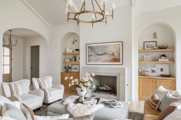 Living Room with Gray Ottoman and Faux Fur Accessories
