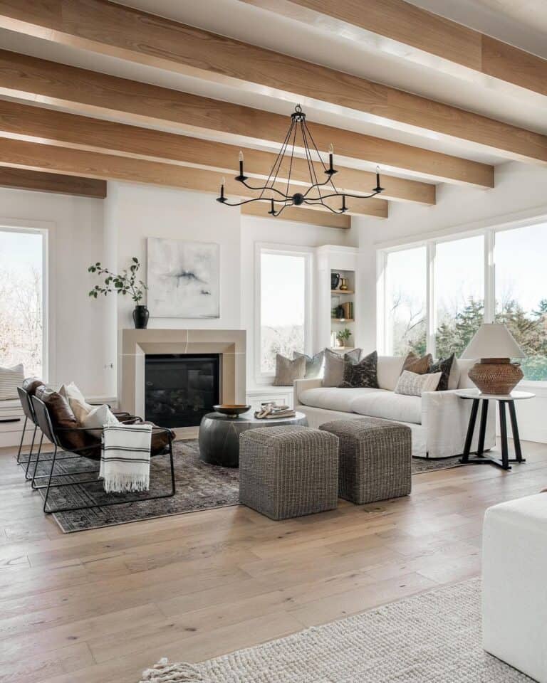 Living Room with Wood Beamed Ceiling and Modern Light Wood Floors