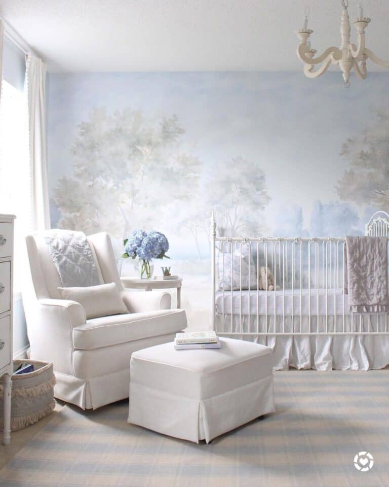 Lovely Blue Mural Paper on a Baby Girl Nursery Wall