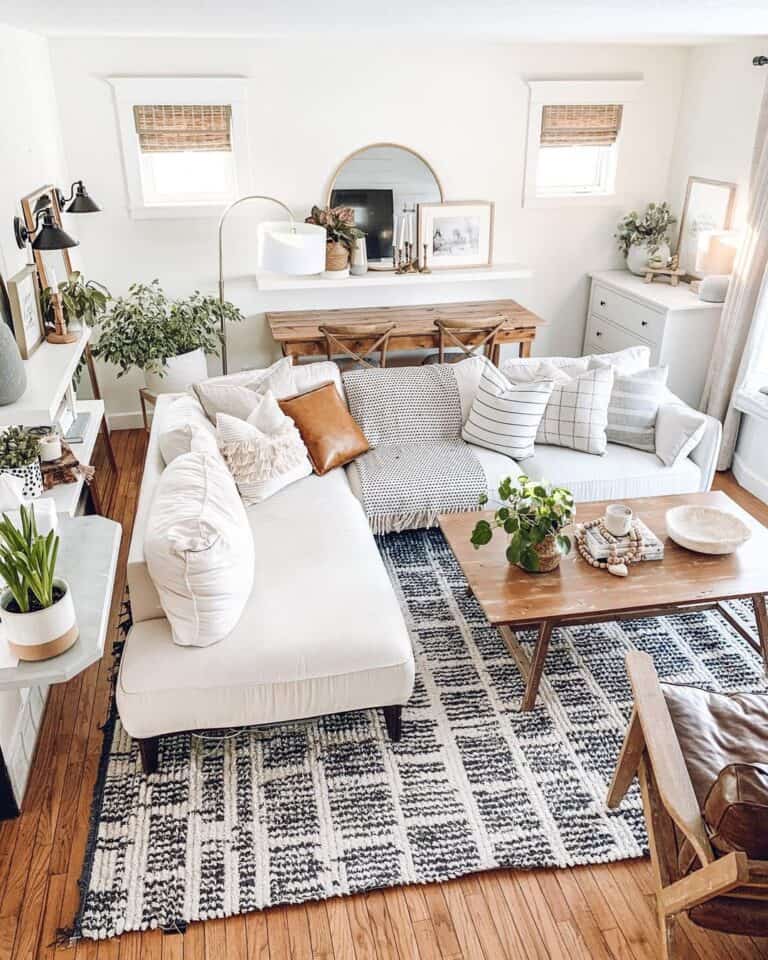 https://www.soulandlane.com/wp-content/uploads/2022/10/Low-White-Sofa-with-Matching-Pillows-and-Leather-Accent-Pillow-768x960.jpg