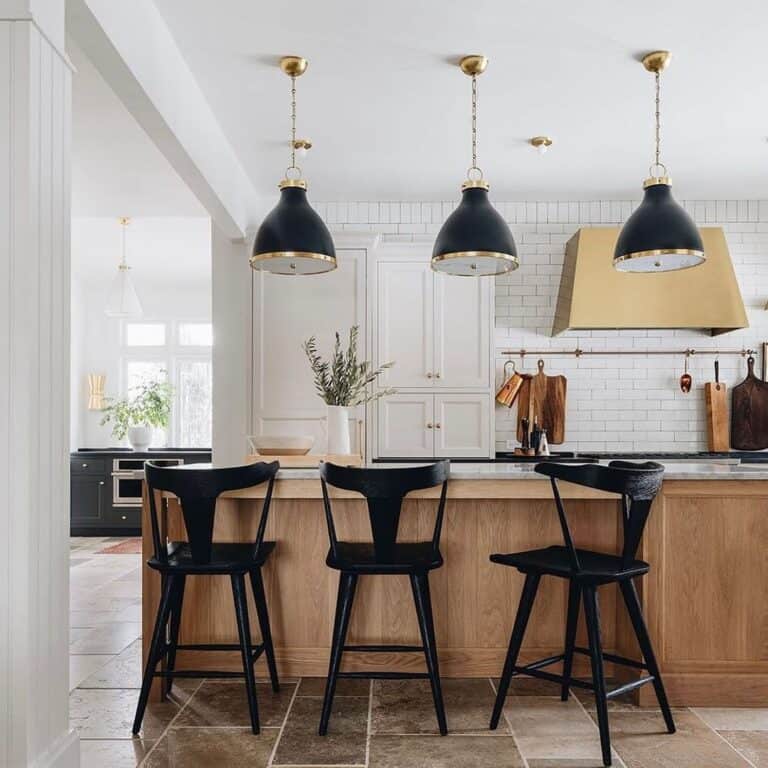 Matte Black Bar Stools on a Brown Tile Floor