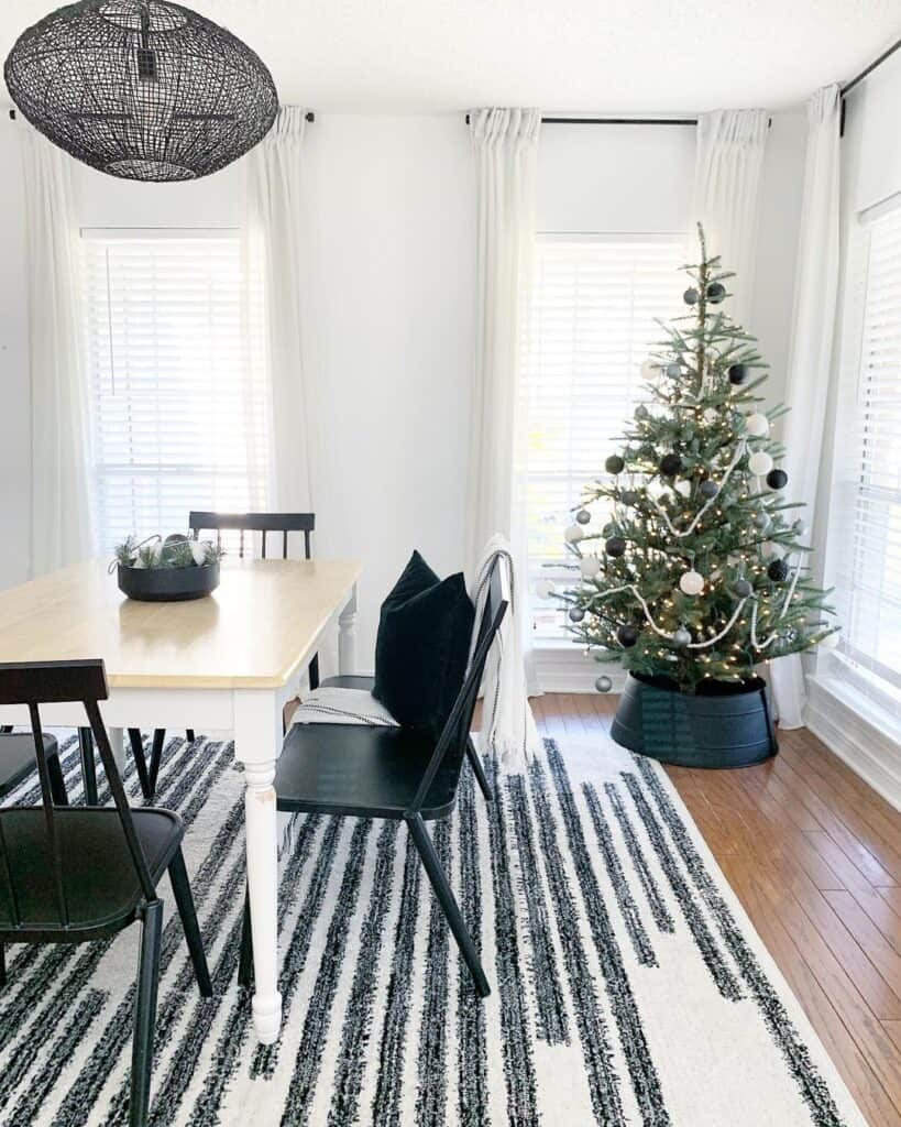Modern Dining Room with White and Black Christmas   Tree Decorations