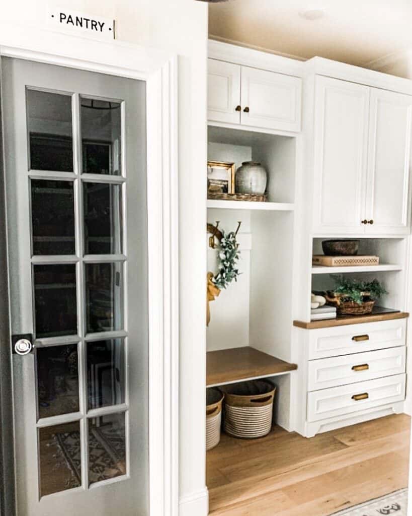 Mudroom Nook with White Cupboards and Drawers