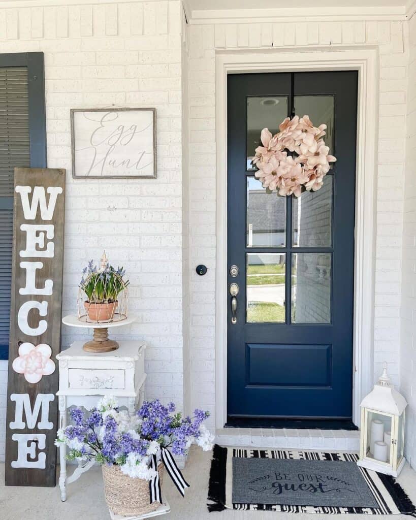 Navy Blue Exterior Door with Pale Pink Wreath