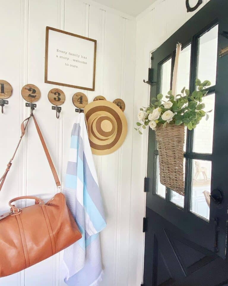 Numbered Wall Hooks in Paneled Entryway