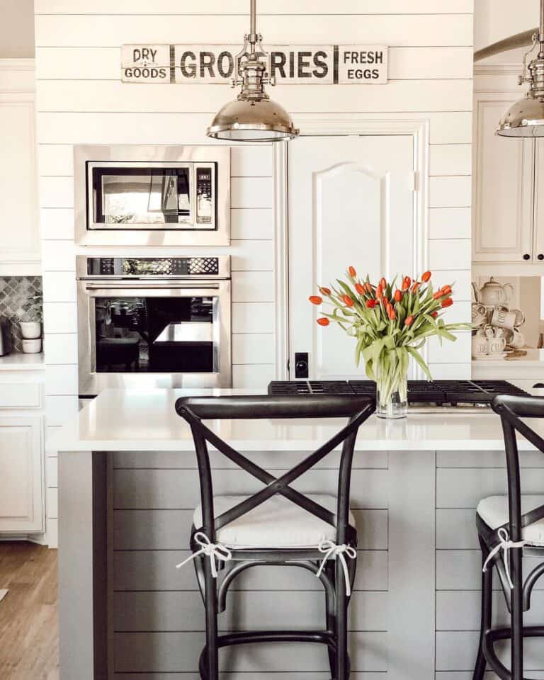 Orange Tulips and Black Bar Stools