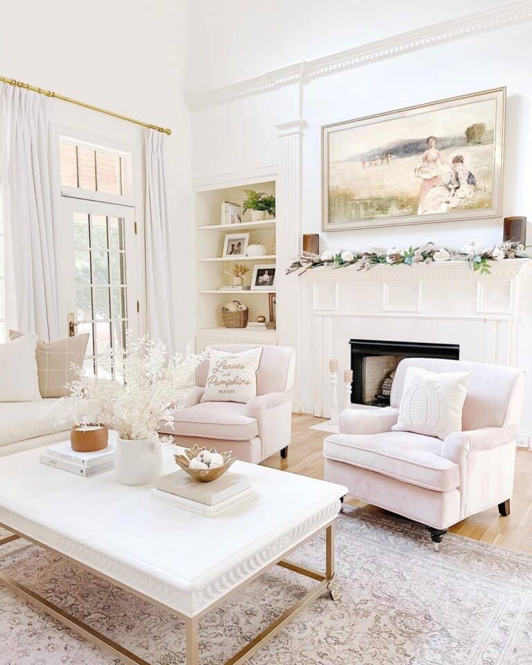 Pink Blush Chairs With White and Gold Pillows