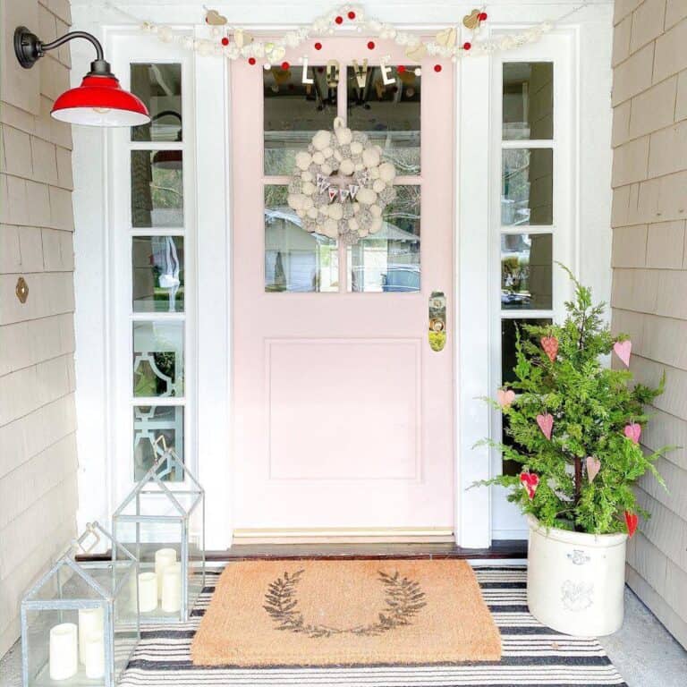 Pink Front Door with Valentine's Day Decor