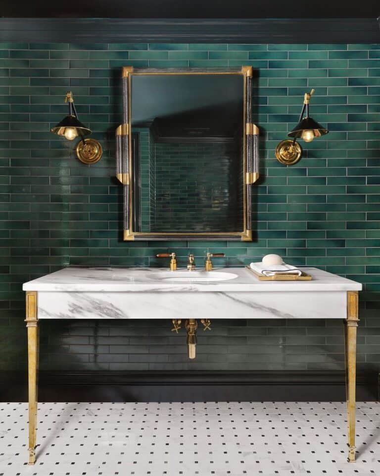 Powder Room with Black and Gold Lamp Sconces