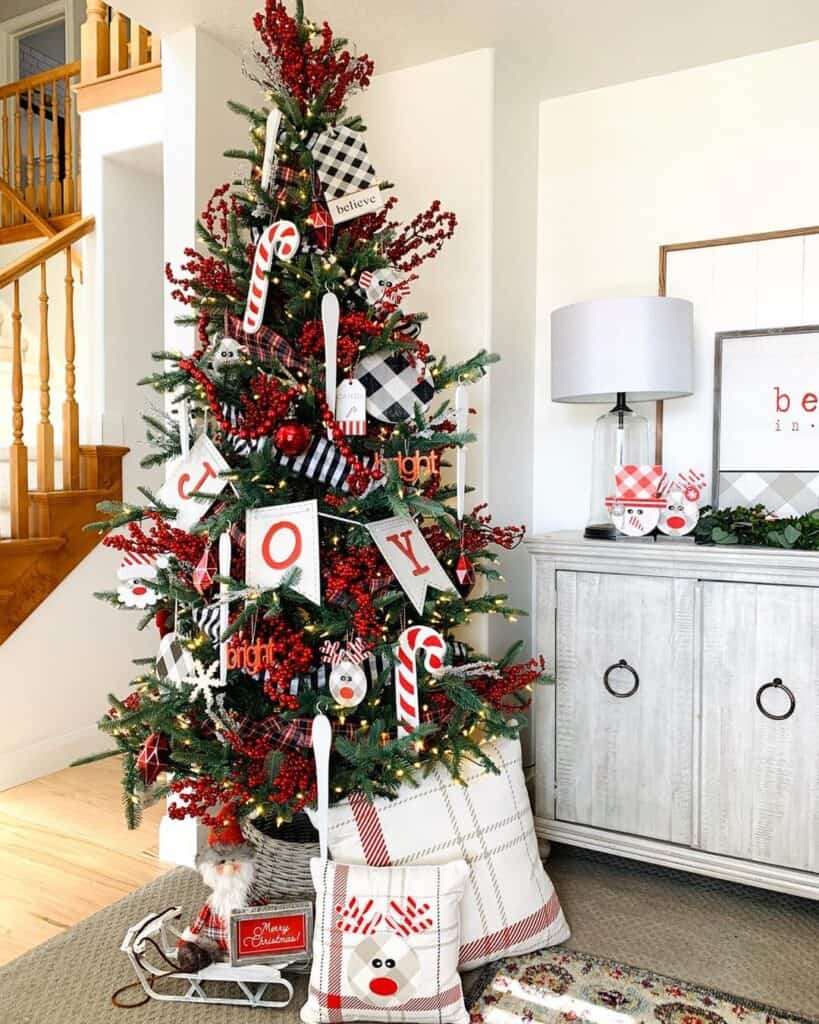 Red Accent Decorations on Christmas Tree