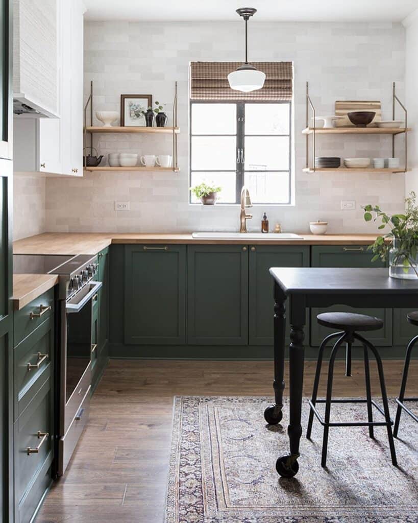 Rustic Sage Green Kitchen Cabinets and a Gold Gooseneck Sink