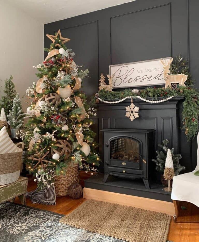 Rustic Silver and Gold Christmas Tree Decorations Near a Black Mantel