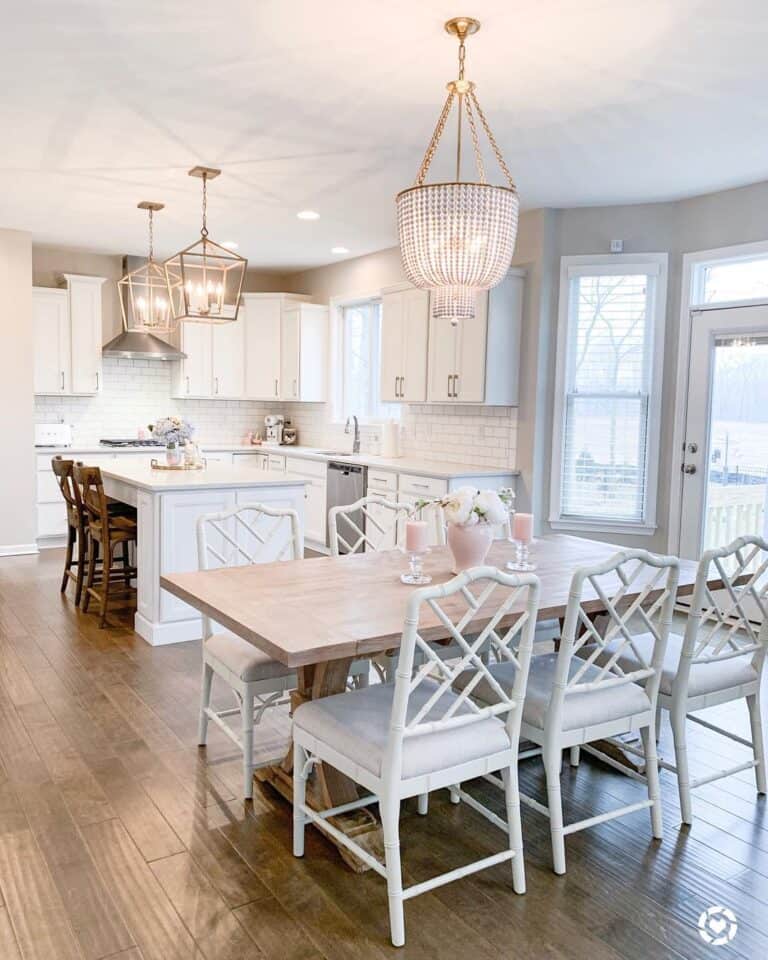 Rustic White Dining Chairs Under a Beaded Pendant Light