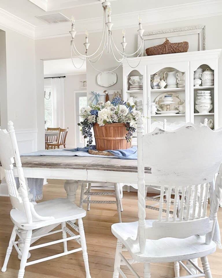 Rustic White Dining Chairs and a Distressed White Table