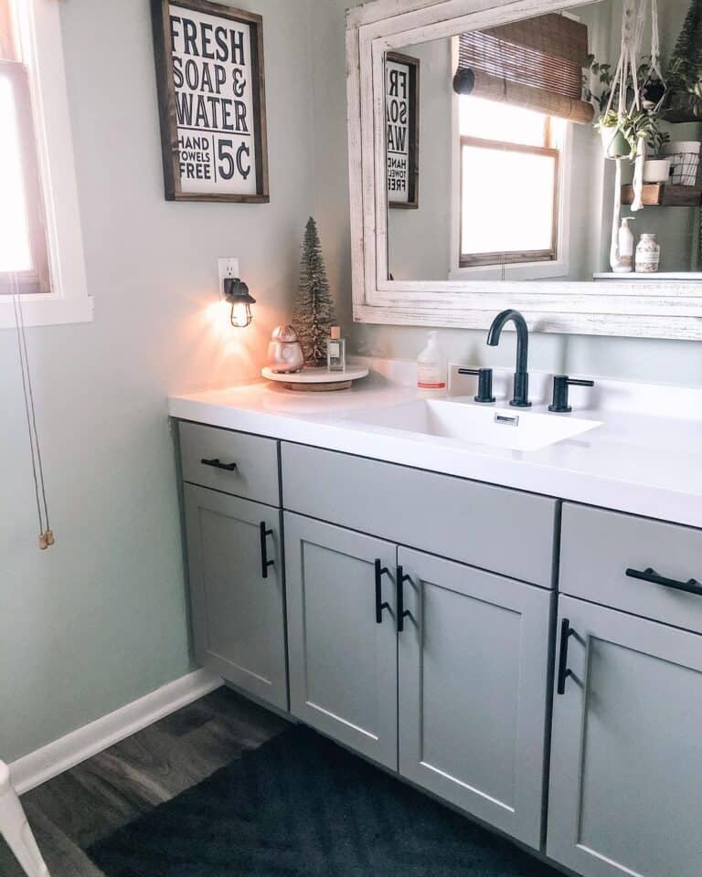 Rustic White Mirror Above Grey Bathroom Cabinets