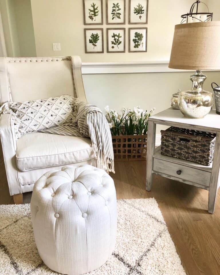 Seating Area with White Chair and Matching Pouf