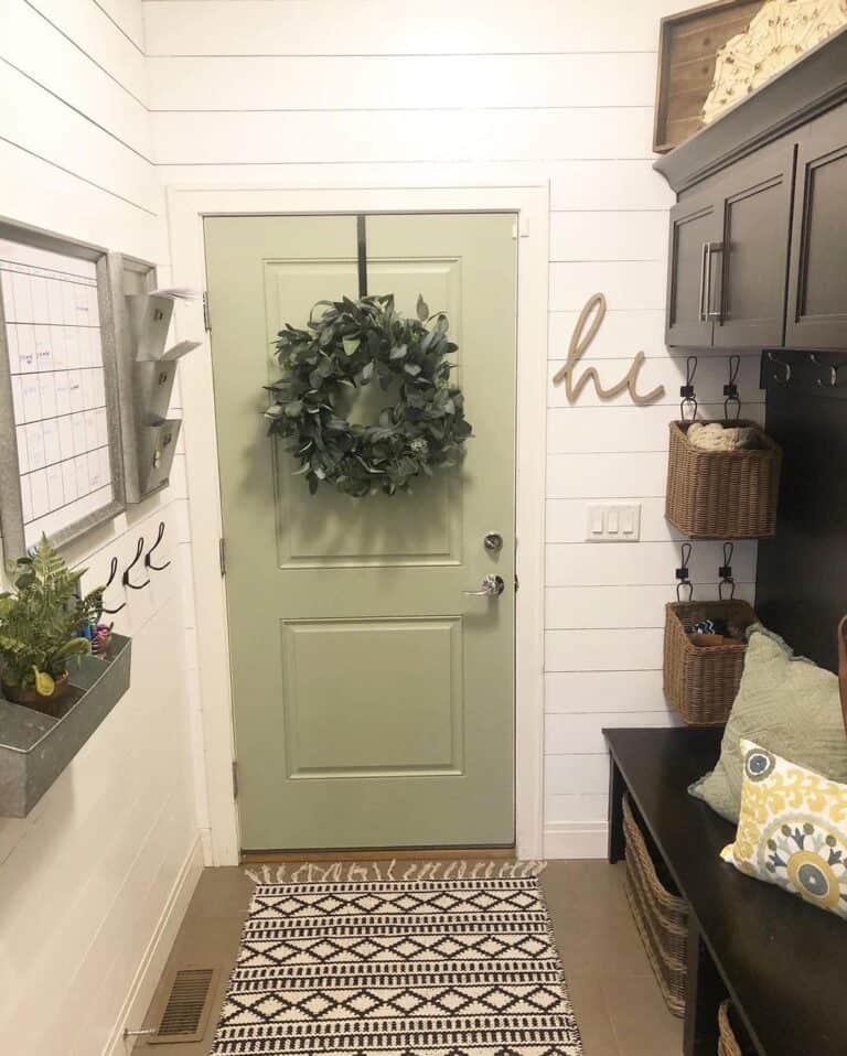 Shiplap Mudroom with Sage Two-Panel Door