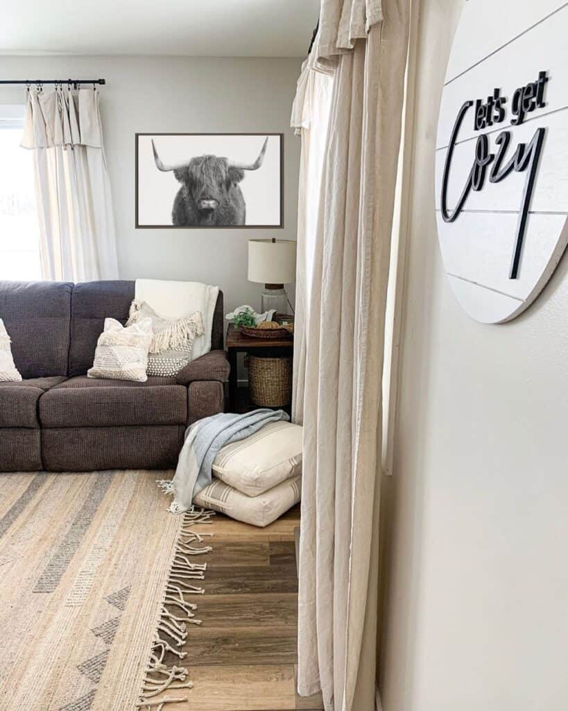 Square Living Room Poufs and a Brown Sofa