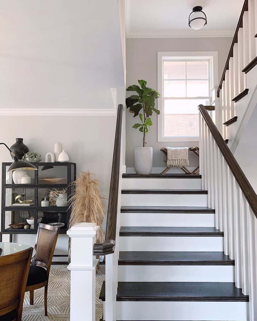 Stair Landing with White Planter and Stools