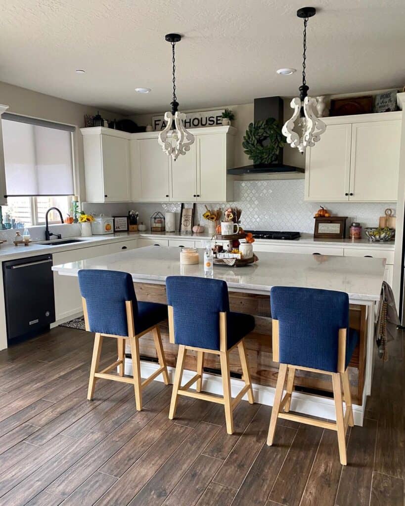 Tall Navy Blue Chairs at a White Kitchen Island