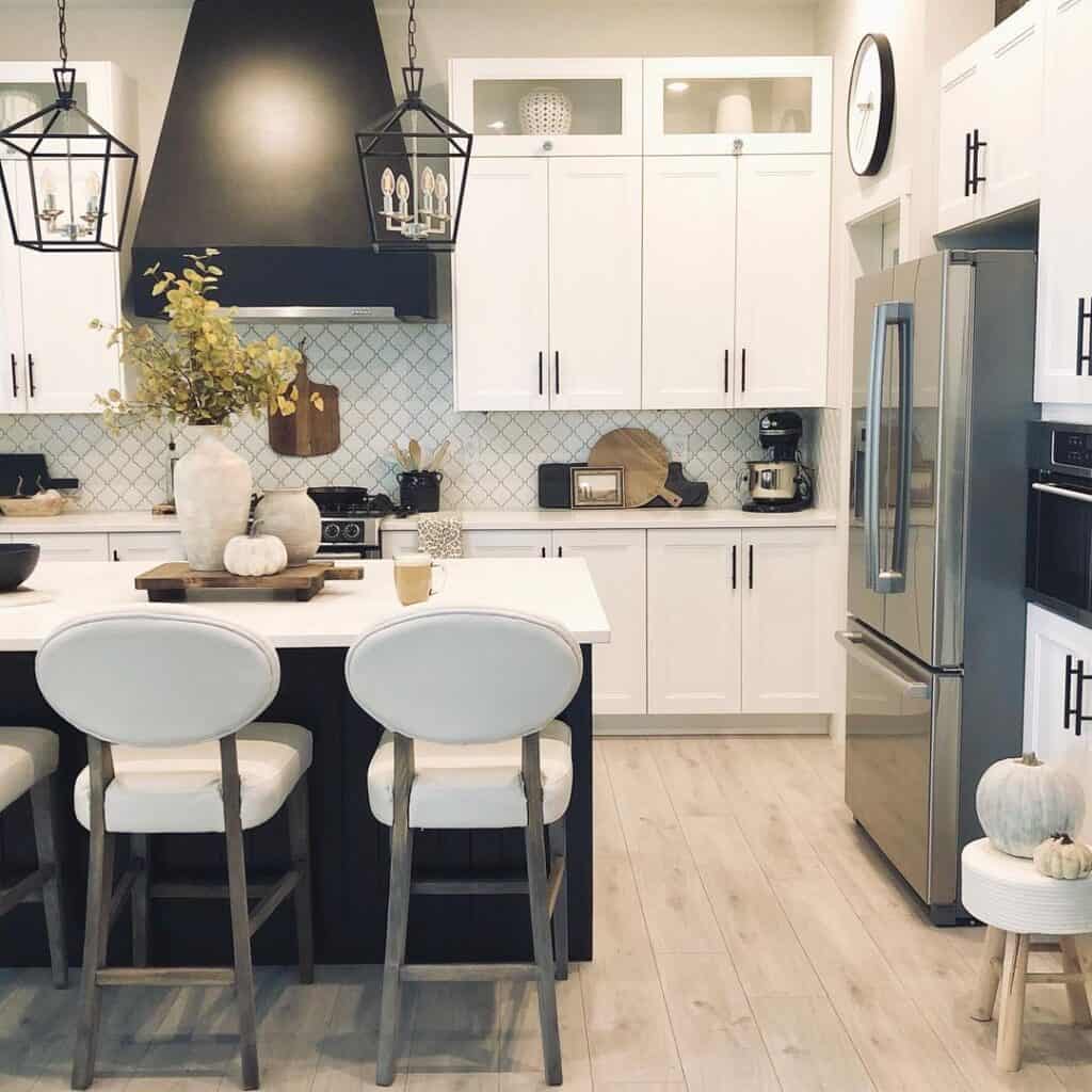 Vertical Black T-Bar Pulls on White Cabinets